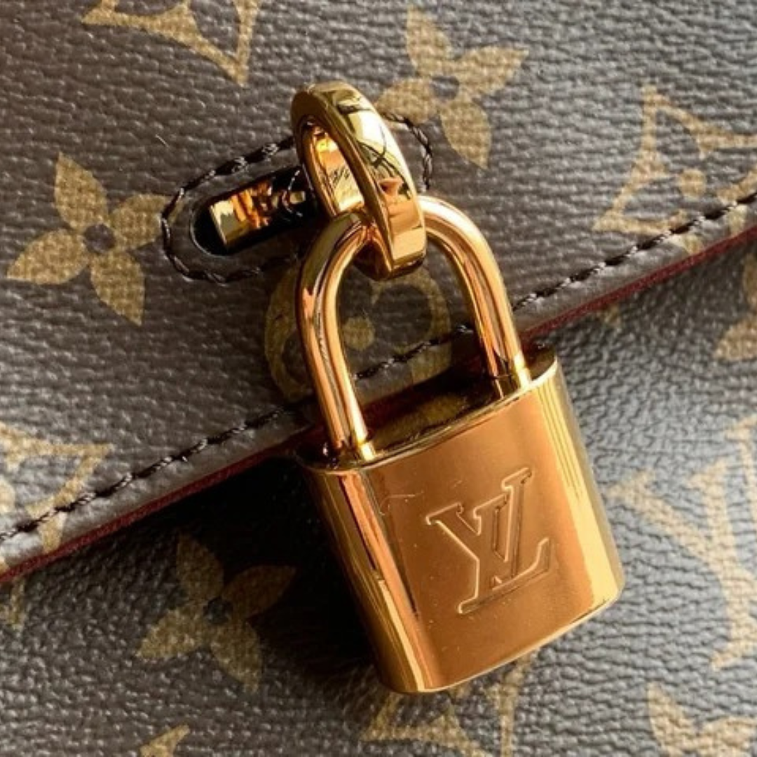 LOUIS VUITTON – CARTERA HIDE AWAY MM