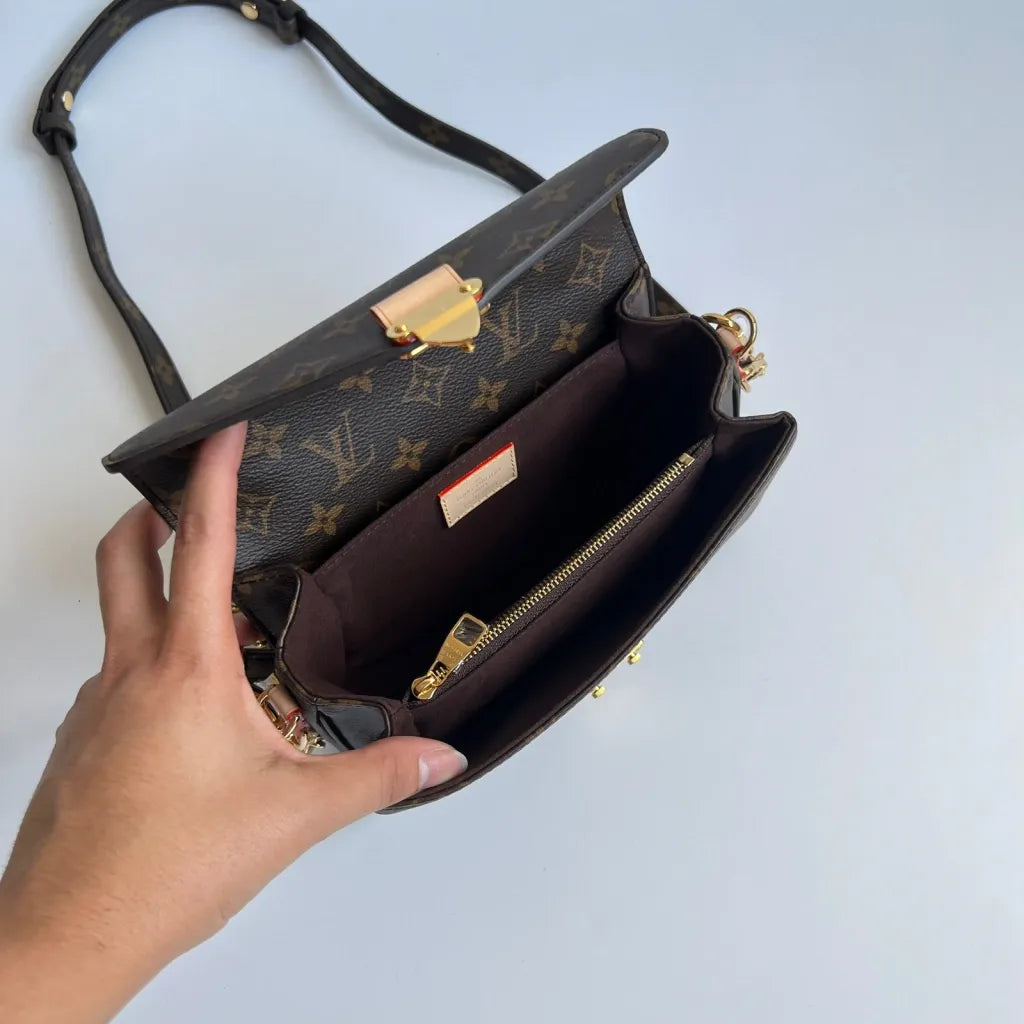 LOUIS VUITTON – EAST WEST MÉTIS CLUTCH