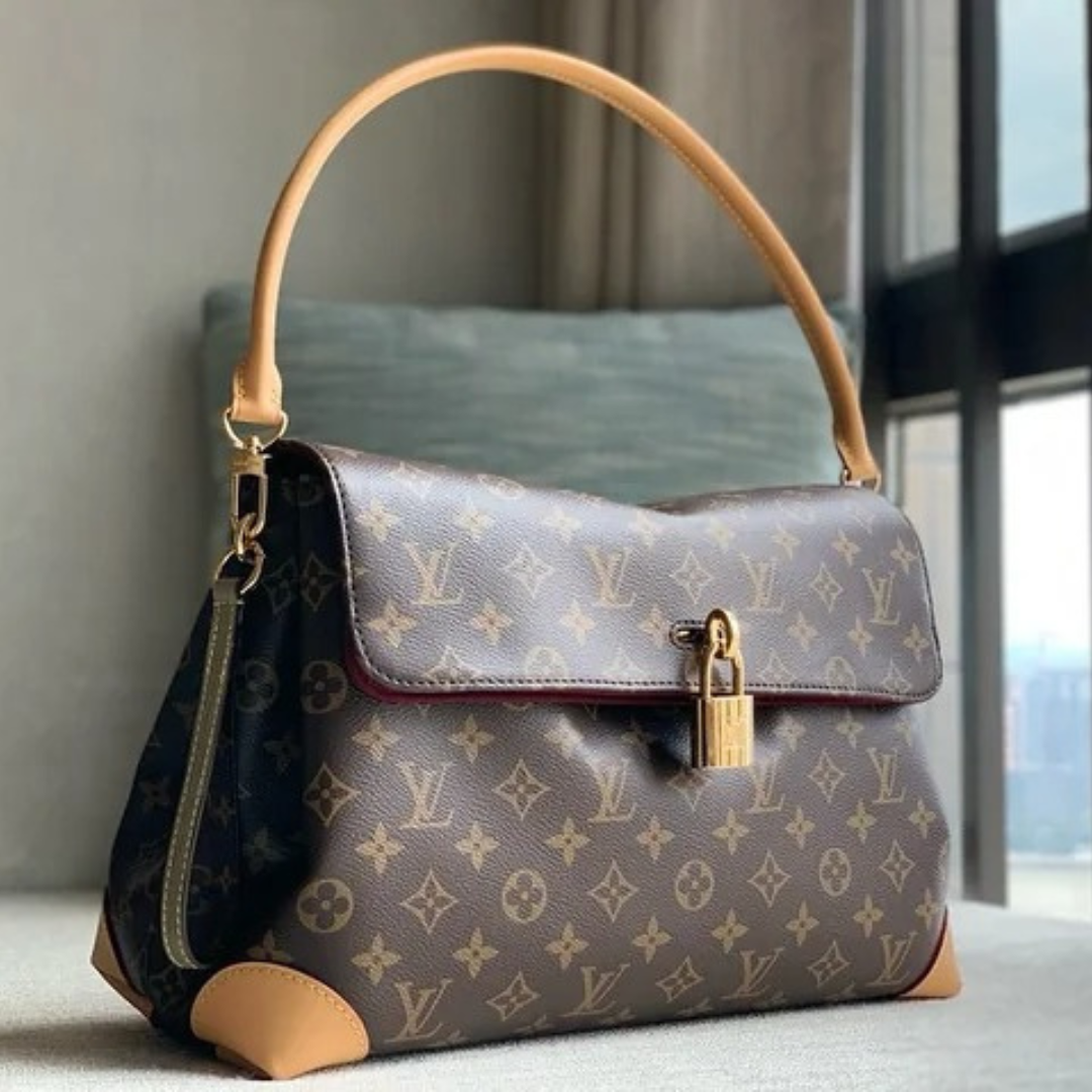 LOUIS VUITTON – CARTERA HIDE AWAY MM